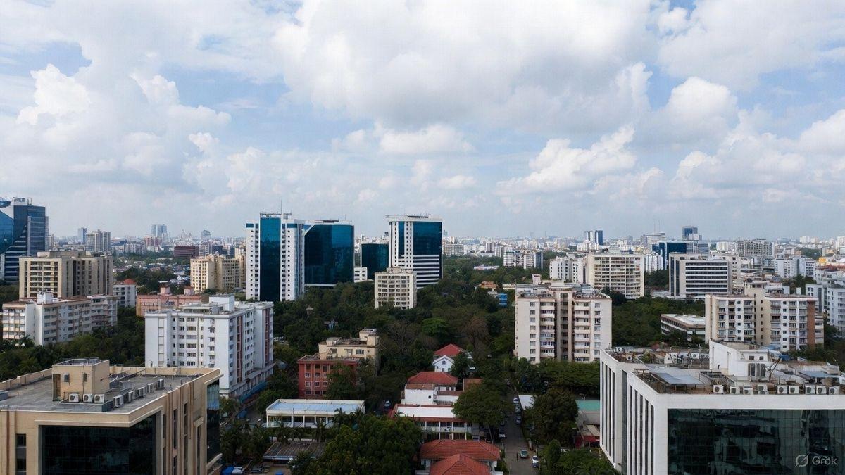 "Modern Bangalore skyline featuring residential towers, commercial buildings, metro connectivity, and rapidly developing real estate corridors across the city."